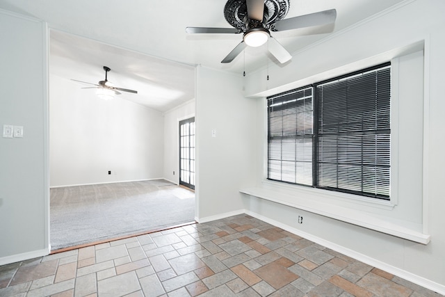 9406 Shipman St, Rowlett, TX 75088 - carpeted spare room featuring ceiling fan, baseboards, stone tile flooring, and crown molding