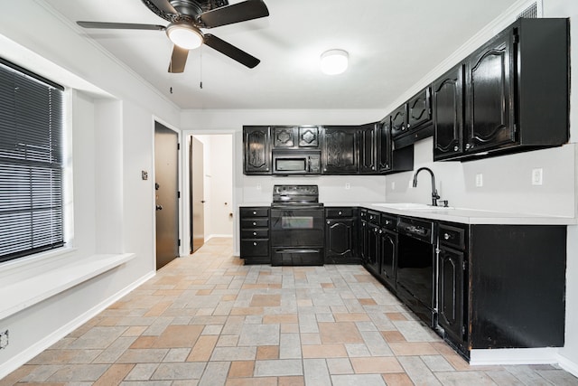 9406 Shipman St, Rowlett, TX 75088 - kitchen featuring dark cabinets, black appliances, a sink, ceiling fan, and light countertops