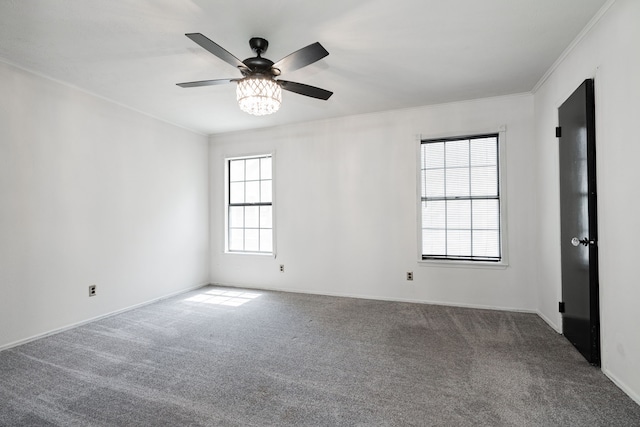 9406 Shipman St, Rowlett, TX 75088 - carpeted spare room featuring ornamental molding, a ceiling fan, and baseboards