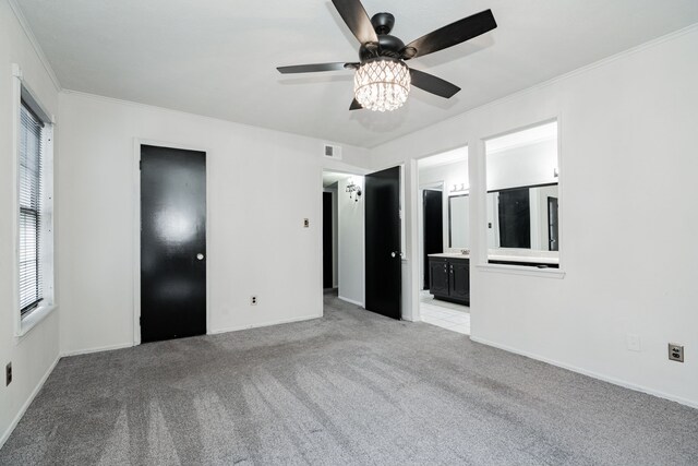 9406 Shipman St, Rowlett, TX 75088 - unfurnished bedroom with light carpet, ornamental molding, baseboards, ensuite bathroom, and ceiling fan