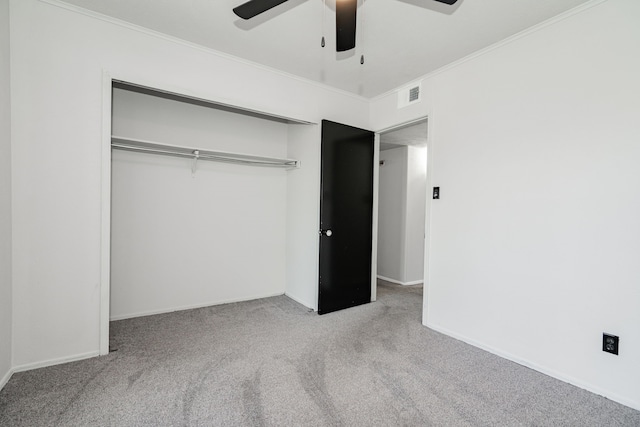9406 Shipman St, Rowlett, TX 75088 - unfurnished bedroom with carpet, ornamental molding, baseboards, a closet, and a ceiling fan