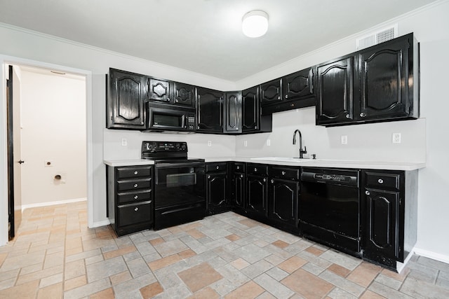 9406 Shipman St, Rowlett, TX 75088 - kitchen featuring black appliances, dark cabinets, a sink, and crown molding