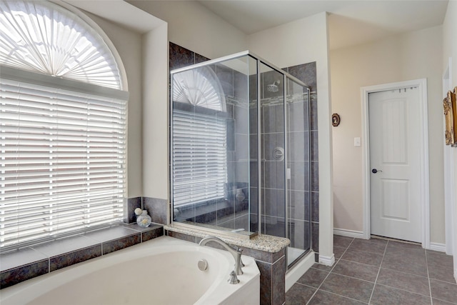 320 Trakehner Trl, Celina, TX 75009 - full bath with a stall shower, a bath, tile patterned floors, and baseboards