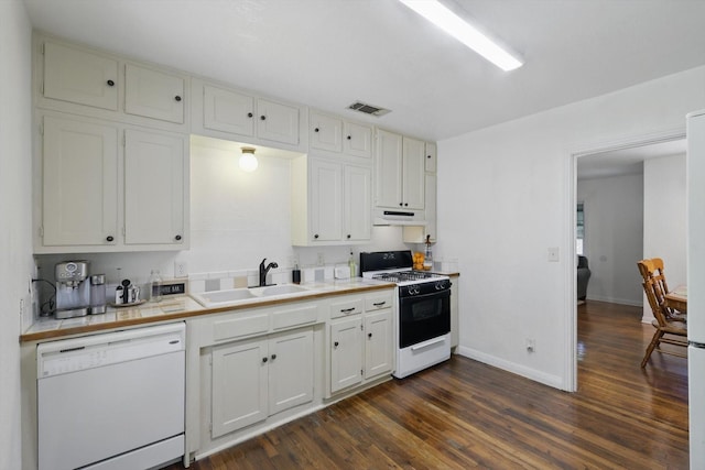 7348 Pensacola Ave, Fort Worth, TX 76116 - kitchen with range with gas stovetop, dishwasher, a sink, under cabinet range hood, and tile countertops