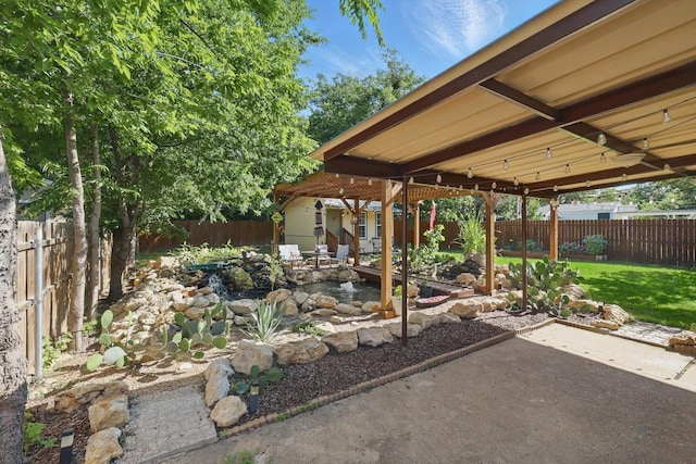 7348 Pensacola Ave, Fort Worth, TX 76116 - view of patio featuring a garden pond