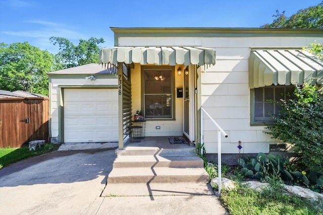 7348 Pensacola Ave, Fort Worth, TX 76116 - view of front of house featuring a garage and driveway