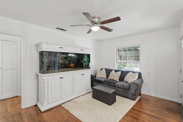 7348 Pensacola Ave, Fort Worth, TX 76116 - living area with a ceiling fan, wood finished floors, and baseboards