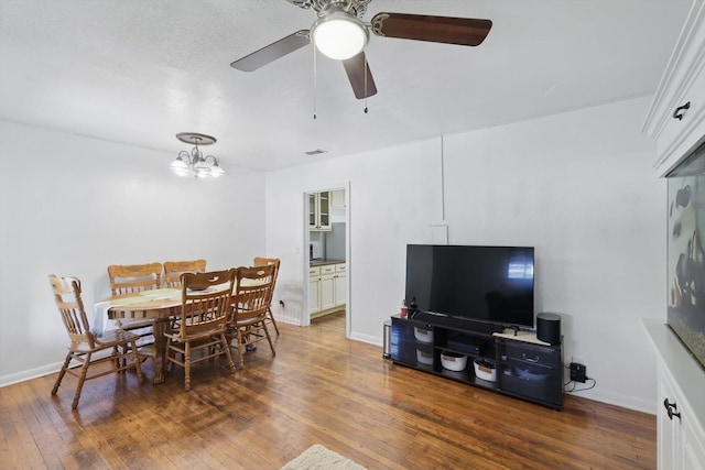 7348 Pensacola Ave, Fort Worth, TX 76116 - dining area featuring hardwood / wood-style flooring, a ceiling fan, and baseboards