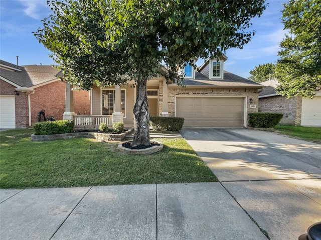 6400 Hawthorn Dr, Denton, TX 76208 - view of property hidden behind natural elements with an attached garage, covered porch, a front yard, concrete driveway, and brick siding