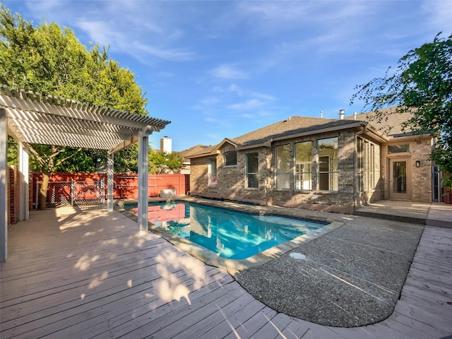 6400 Hawthorn Dr, Denton, TX 76208 - view of pool featuring a pergola, a wooden deck, and a fenced backyard
