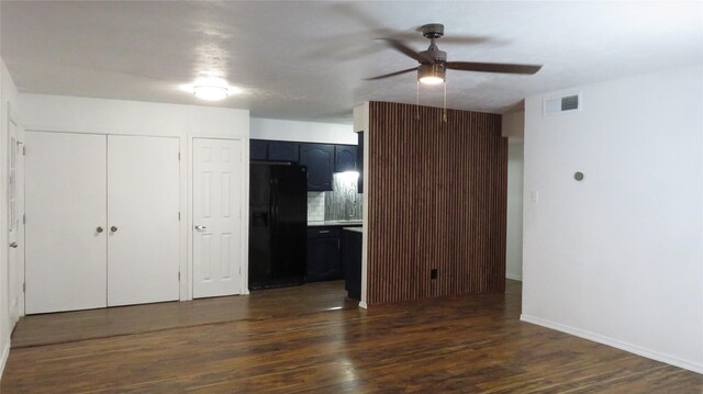 7121 Harwick Ln, North Richland Hills, TX 76182 - unfurnished living room with ceiling fan, dark wood-style flooring, and baseboards