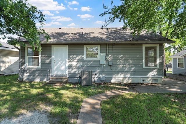 2320 Herring Ave, Waco, TX 76708 - view of front of house with entry steps, a front yard, central AC unit, and a patio area