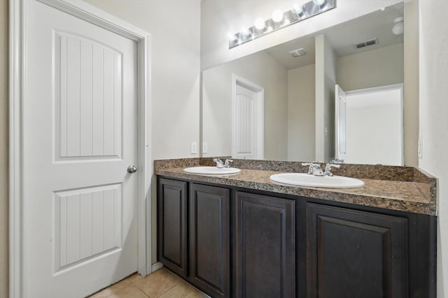 309 Pimlico Way, Ponder, TX 76259 - bathroom featuring double vanity and tile patterned floors