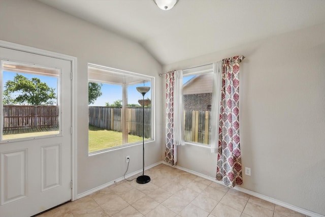 309 Pimlico Way, Ponder, TX 76259 - unfurnished dining area featuring vaulted ceiling and baseboards