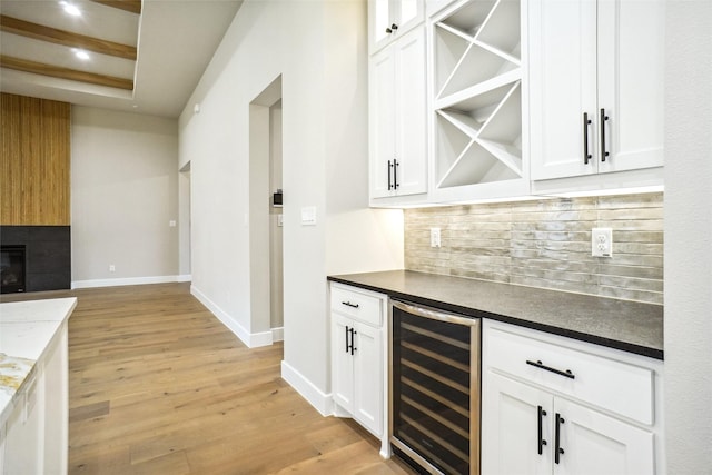 3621 Barber Crk, Fort Worth, TX 76244 - indoor dry bar with beverage cooler, decorative backsplash, light wood-style flooring, baseboards, and recessed lighting