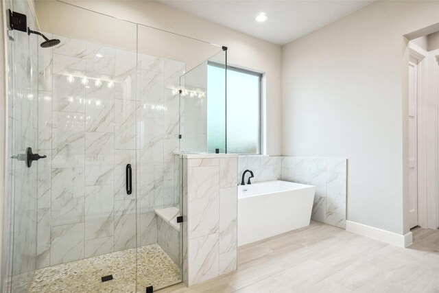 3621 Barber Crk, Fort Worth, TX 76244 - full bath with a soaking tub, a marble finish shower, and recessed lighting