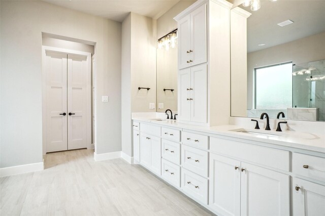 3621 Barber Crk, Fort Worth, TX 76244 - full bathroom featuring double vanity, a stall shower, and baseboards