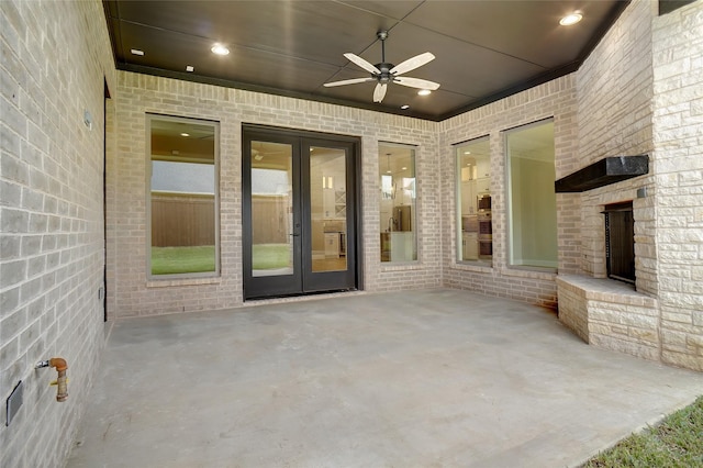 3621 Barber Crk, Fort Worth, TX 76244 - view of patio / terrace featuring french doors, ceiling fan, and a large fireplace