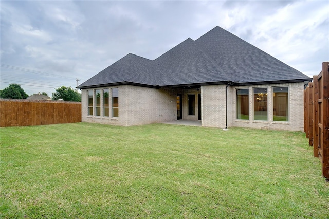 3621 Barber Crk, Fort Worth, TX 76244 - rear view of house with brick siding, a shingled roof, and a patio