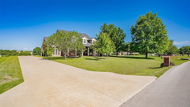 1905 Yucatan Dr, Granbury, TX 76048 - surrounding community featuring a lawn