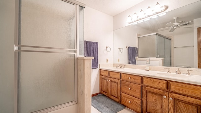 1905 Yucatan Dr, Granbury, TX 76048 - bathroom featuring a shower with door, double vanity, a ceiling fan, and tile patterned flooring