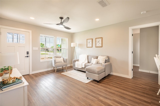 living area with ceiling fan, wood finished floors, baseboards, and recessed lighting