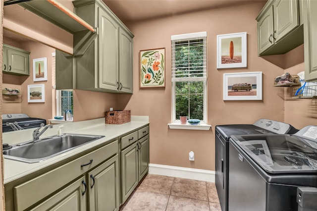 124 Oakvista Dr, Aledo, TX 76008 - laundry area featuring washer and clothes dryer, cabinet space, baseboards, and light tile patterned floors