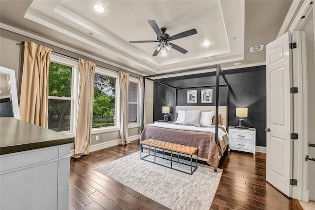 124 Oakvista Dr, Aledo, TX 76008 - bedroom with a raised ceiling, dark wood finished floors, baseboards, ornamental molding, and recessed lighting