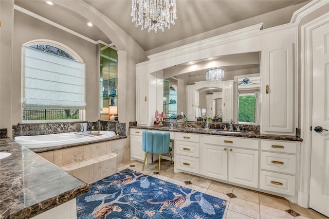 124 Oakvista Dr, Aledo, TX 76008 - bathroom with healthy amount of natural light, vanity, a bath, and ornamental molding