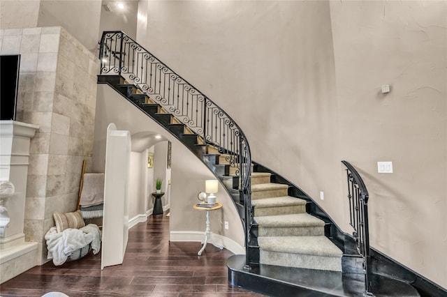 124 Oakvista Dr, Aledo, TX 76008 - staircase with a towering ceiling and wood finished floors