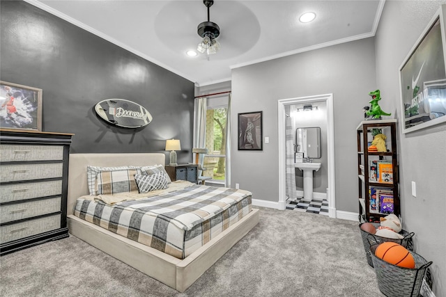 124 Oakvista Dr, Aledo, TX 76008 - carpeted bedroom featuring crown molding, recessed lighting, connected bathroom, baseboards, and a sink