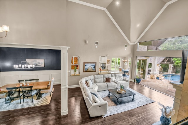 124 Oakvista Dr, Aledo, TX 76008 - living room featuring a chandelier, wood-type flooring, high vaulted ceiling, and healthy amount of natural light