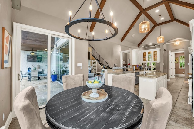 124 Oakvista Dr, Aledo, TX 76008 - dining space with a chandelier, stairway, high vaulted ceiling, and baseboards