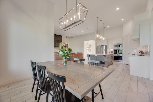 467 Red Bird Dr, Springtown, TX 76082 - dining area featuring recessed lighting, a chandelier, and baseboards