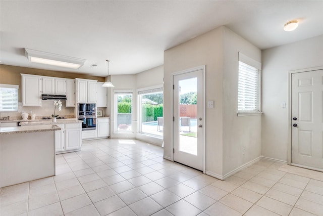 4136 Timberglen Rd, Dallas, TX 75287 - kitchen featuring white cabinets, extractor fan, gas cooktop, and pendant lighting