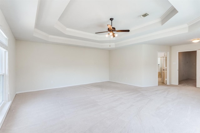 4136 Timberglen Rd, Dallas, TX 75287 - spare room with a raised ceiling, ornamental molding, ceiling fan, light carpet, and baseboards