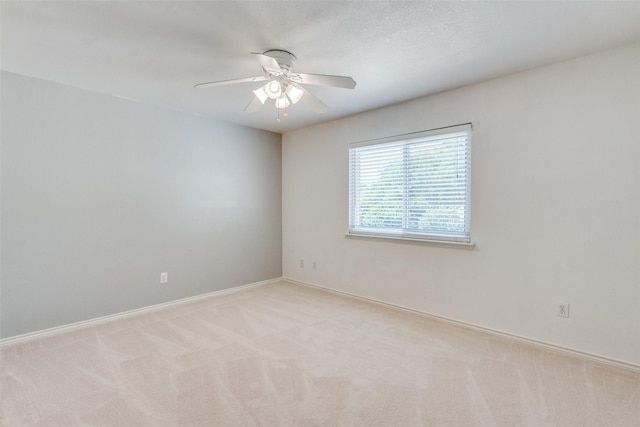 4136 Timberglen Rd, Dallas, TX 75287 - spare room with a ceiling fan, light colored carpet, and baseboards