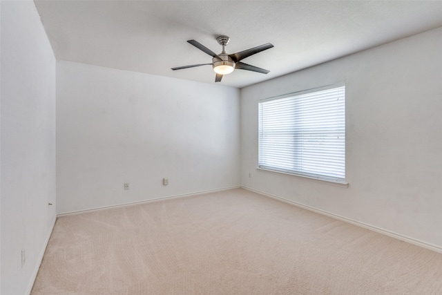 4136 Timberglen Rd, Dallas, TX 75287 - unfurnished room featuring plenty of natural light, a ceiling fan, light carpet, and baseboards
