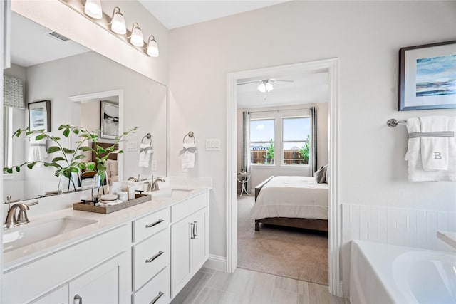 300 Thorn Creek Dr, Anna, TX 75409 - ensuite bathroom with a bath, double vanity, and ceiling fan