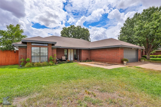 5249 Western Plains Ave, Abilene, TX 79606 - single story home featuring brick siding, an attached garage, and driveway