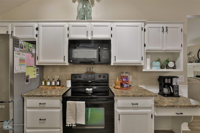 5249 Western Plains Ave, Abilene, TX 79606 - kitchen with black appliances, white cabinetry, and light stone countertops
