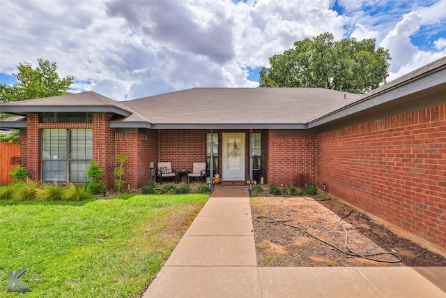 5249 Western Plains Ave, Abilene, TX 79606 - view of front of property featuring a front yard and brick siding