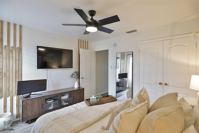5249 Western Plains Ave, Abilene, TX 79606 - bedroom with a closet, ceiling fan, and wood finished floors