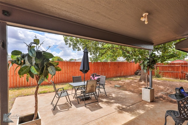 5249 Western Plains Ave, Abilene, TX 79606 - view of patio featuring outdoor dining area and a fenced backyard