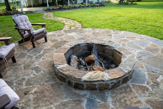 301 W Larissa St, Jacksonville, TX 75766 - view of patio / terrace featuring an outdoor fire pit