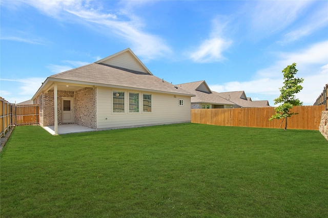 2560 Eden Creek Dr, Fort Worth, TX 76179 - rear view of house with a patio area, brick siding, and a shingled roof