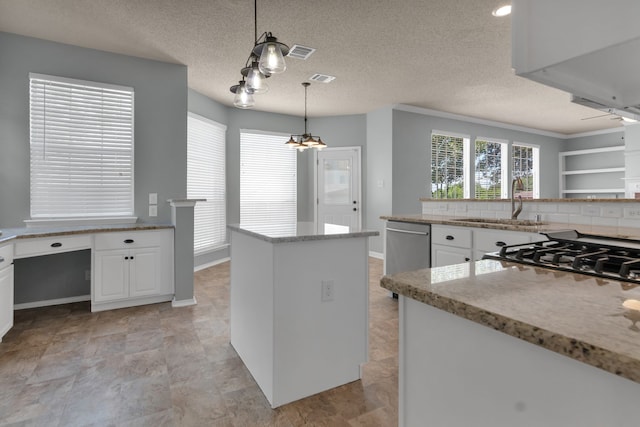4504 Angelina Way, Fort Worth, TX 76137 - kitchen with a sink, dishwasher, white cabinets, a center island, and a textured ceiling