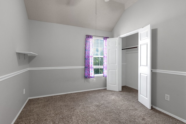 4504 Angelina Way, Fort Worth, TX 76137 - unfurnished bedroom featuring vaulted ceiling, carpet, a closet, a textured ceiling, and baseboards