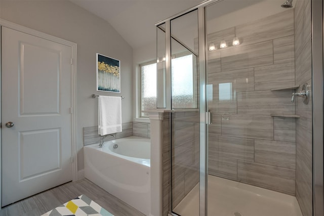 3750 Pinyon Pine Way, Venus, TX 76084 - bathroom featuring a stall shower, lofted ceiling, a bath, and wood finished floors