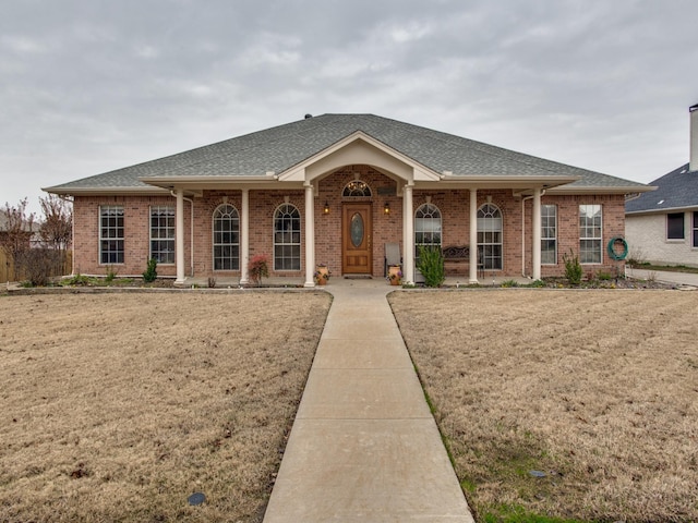 503 Hillcrest Ln, Krum, TX 76249 - single story home with brick siding, roof with shingles, and a front yard
